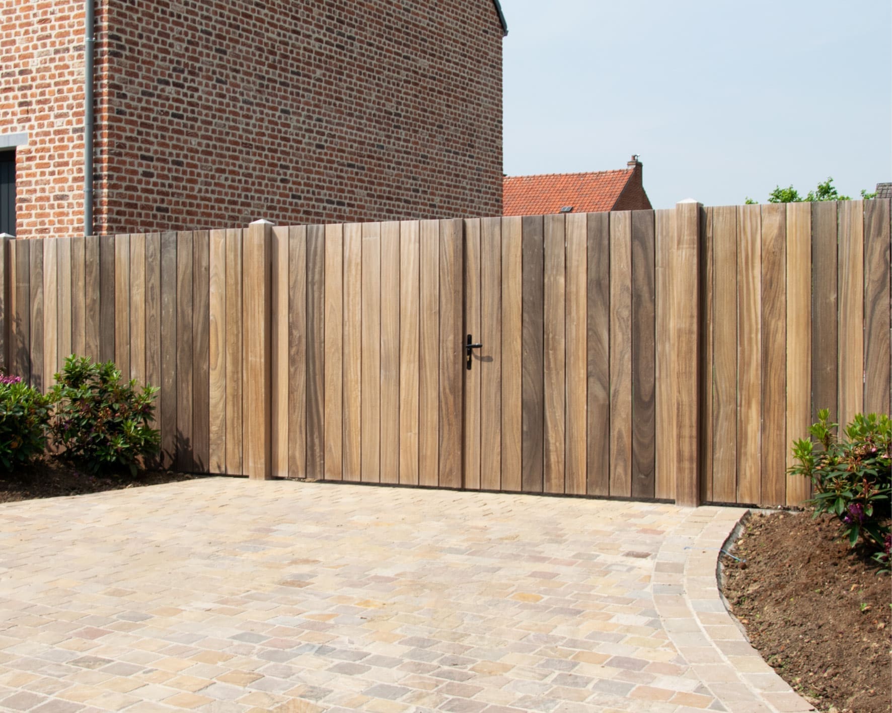 Tuinafsluitingen en Poorten